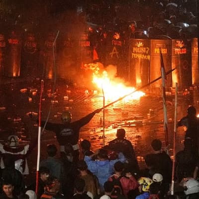 Three dead in Indonesia protests as govt building burns