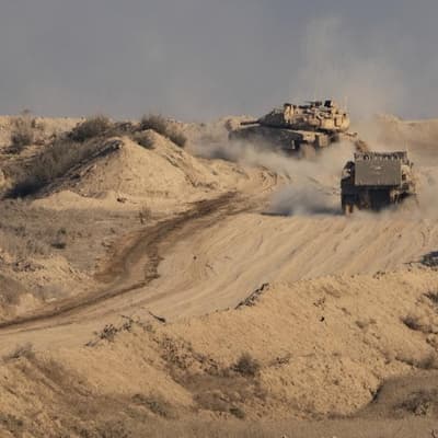 Israel sends tanks deeper into Gaza City