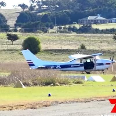 Friend saw men hanging from plane amid skydive 'chaos'