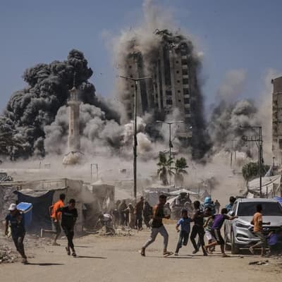 Hamas releases hostage video, Israel bombs high-rise