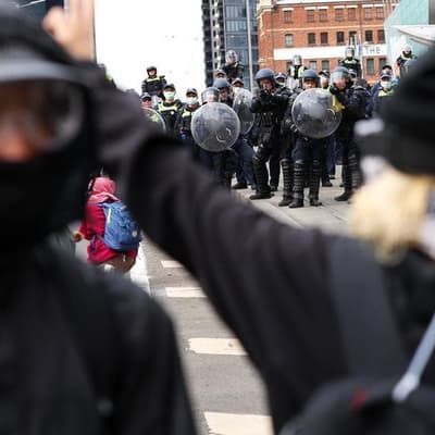 Extreme ideologies on collision course in rival rallies