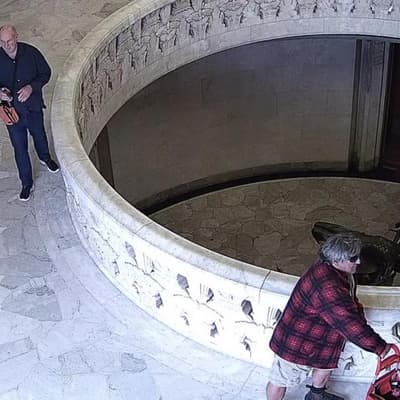 Pair admit damaging memorial in olive oil 'blessing'