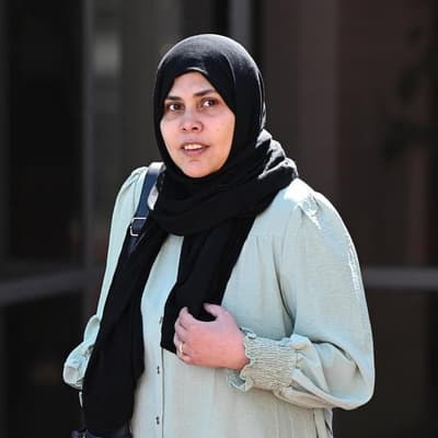 Woman denies trying to drown girls in river