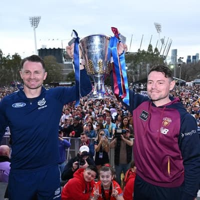 Feline good: Lions and Cats fans turn out to AFL parade
