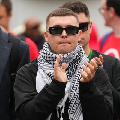 UK court tosses terror charge against Kneecap member