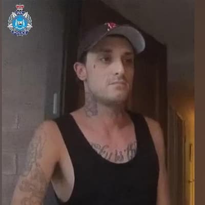 Three charged as missing man's body found in bushland