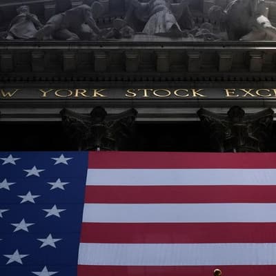 Wall Street retreats from record closing highs