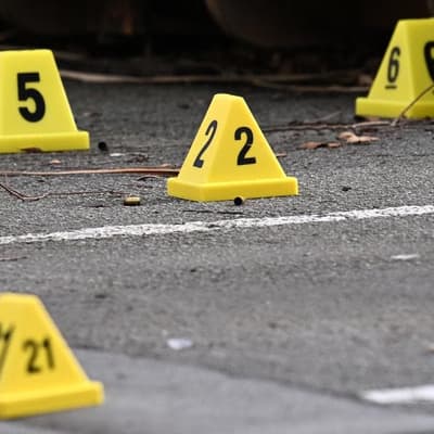 Police staffer arrest prompts forensic evidence review