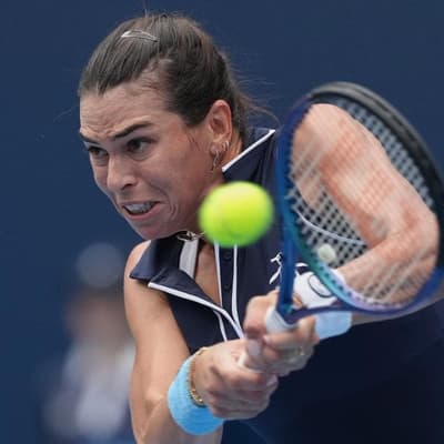 Tomljanovic battles back to knock out seed Tauson