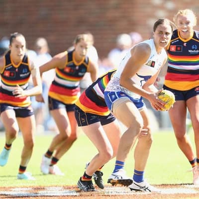 Kangaroos closer to history after Crows demolition job