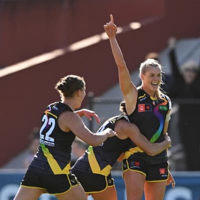 Skipper shines as Tigers hold off Magpies in AFLW