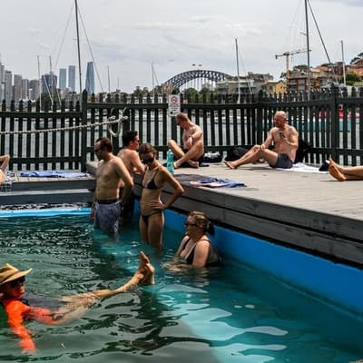 Snap heatwave breaks records as winds wreak havoc