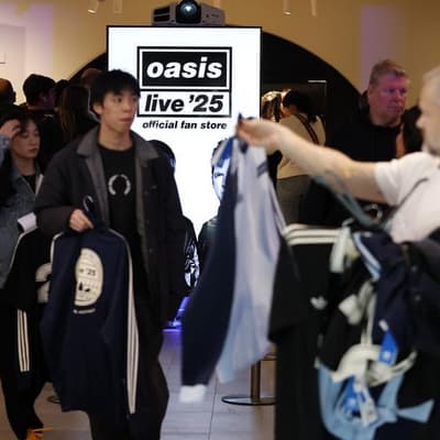Mega fans line up for merch as Oasis countdown begins