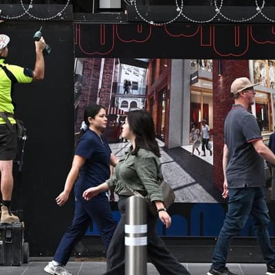 RBA drops rates hint as Australia maintains AAA status