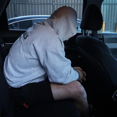 Two charged over role in underworld figure's murder