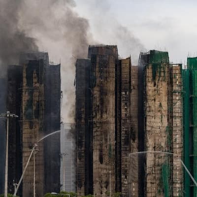 ‘Negligent’ builders blamed for HK blaze that killed 55