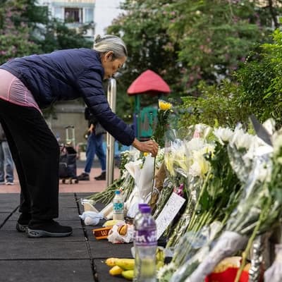 Hong Kong mourns victims of blaze that killed 128