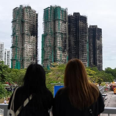 HK arrests more suspects in fire probe as deaths rise