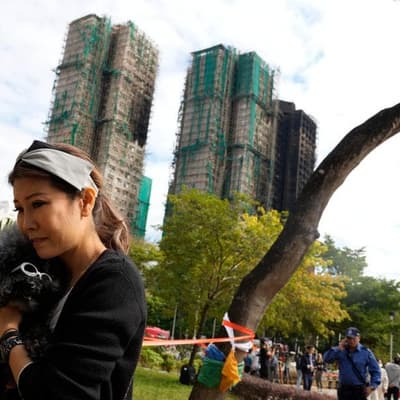 Baby among dead as Hong Kong fire toll hits 159