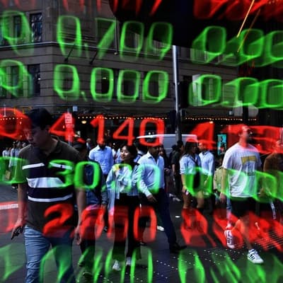 Shares edge upward as miners counter interest rate woes