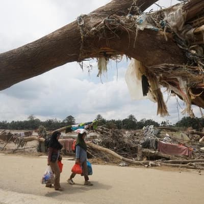 Roads slow relief efforts after Asia's deadly floods