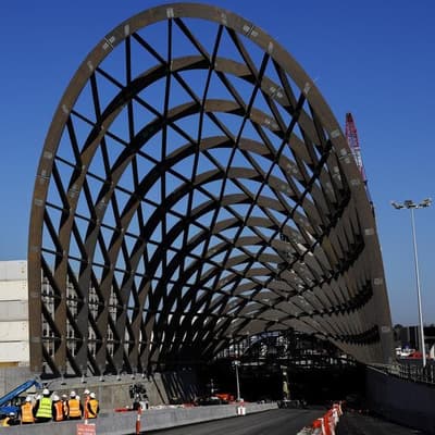 Problem-plagued toll road opens after decade of delays