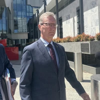 Former attorney-general charged with grooming teen