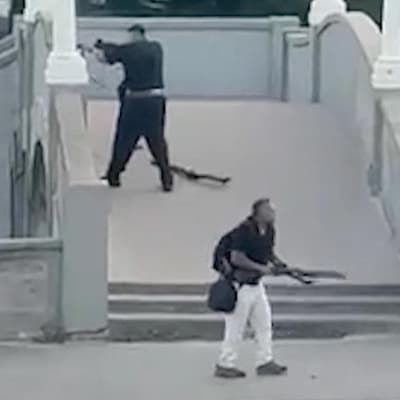 Gunmen linked to Islamic State as flags, bombs found