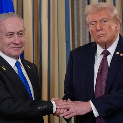 Netanyahu heads for US talks, rain floods Gaza camps