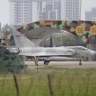 Taiwan stays on high alert as Chinese ships pull back