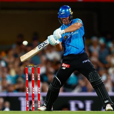 Milestone man Chris Lynn stars as Strikers hammer Heat