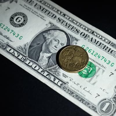 Aussie dollar set for lift but Trump coin toss remains