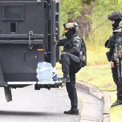 Woman accused of shooting and siege role granted bail