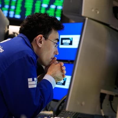 Chip stocks jump on AI optimism, Dow marks record high