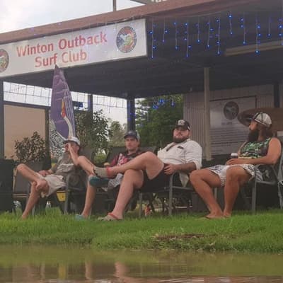 Slow and soggy: life goes on in isolated flood-hit town