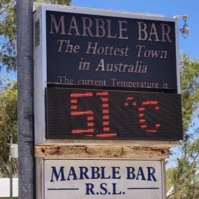 Roads melt as temps soar but locals keep their cool