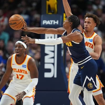 Red-hot Aussie ace helps hungry Hawks feast on Nuggets