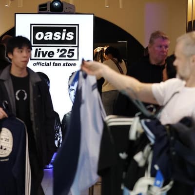Oasis tour tunes up economy but clouds rate cut hopes