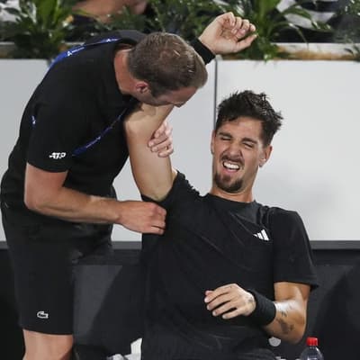 Kokkinakis injury flares, but wins singles comeback