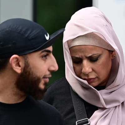 Woman stays mum over cop assault, leaving kids in car