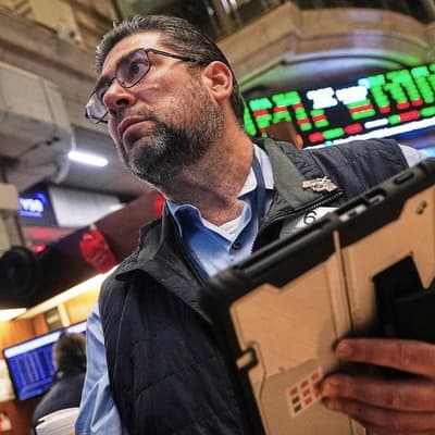 Wall Street ends higher, banks gain following results