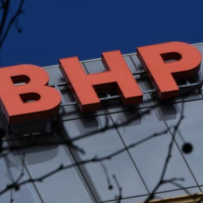 BHP shares dip as overspend outweighs record production