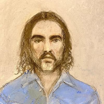 Brand appears in court by video link on further charges