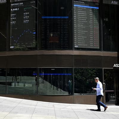 Aussie shares end rocky week slightly lower, gold soars