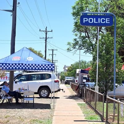 Search widens in manhunt for alleged triple murderer