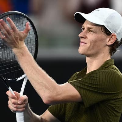 Sinner serves up threat as Open title defence continues