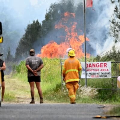 Fiery plane crash kills two men, sparks airfield blaze