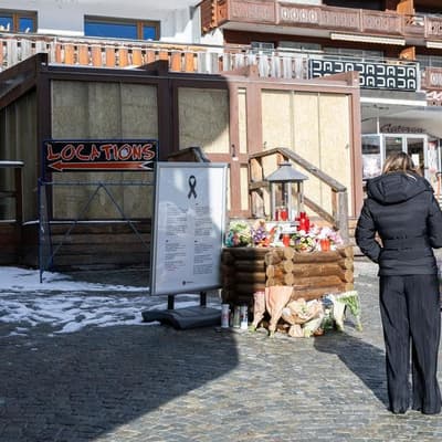 Swiss prosecutors widen fire probe to local authorities