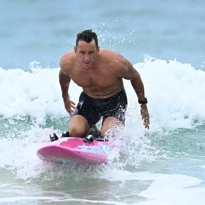 Surf gods smile as Day retires with sixth Iron title