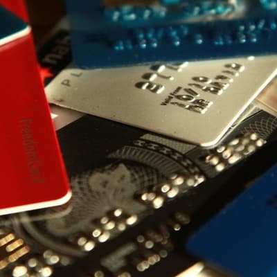 Debt group sees upside in higher credit card balances